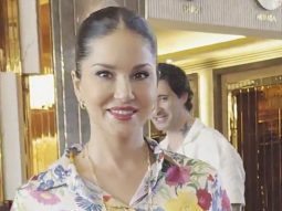 Sunny Leone with husband and kids papped at the opening puja ceremony for her brand new office