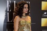 Taapsee wearing gold corset, looking mesmerising