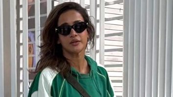 Aisha Sharma’s green sporty sweatshirt is giving