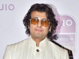 A man in a suit ft. Sonu Nigam