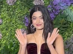 Rashmika Mandanna poses in a glam red velvet gown