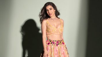 Sophie Choudry redefines Bridal elegance in a stunning yellow and pink lehenga