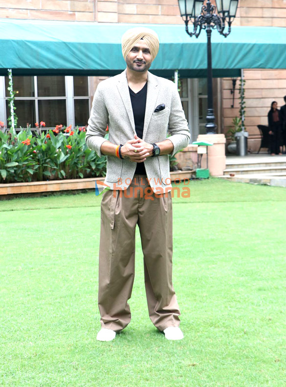 photos former india cricketer harbhajan singh and wife and actress geeta basra unveil their new show whos the boss 7