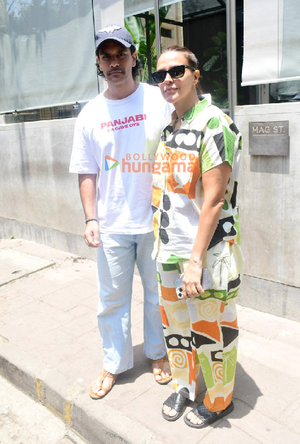 Photos: Neha Dhupia and Angad Bedi snapped at Mag St. in Bandra Photos: Neha Dhupia and Angad Bedi snapped at Mag St. in Bandra