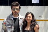 Reem Sameer and Karan Kundraa pose together in a basic fit