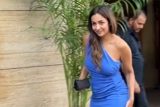 Beautiful Malaika caressing a cute dog