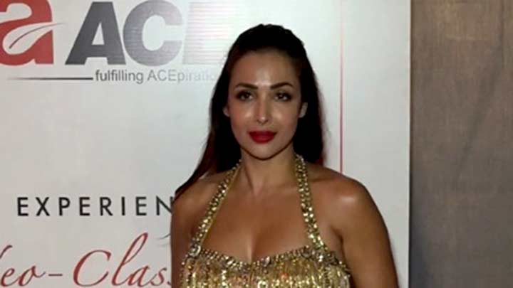 Dazzling as always! Malaika Arora looks gorgeous in this golden tussled outfit