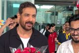 Sweet Gesture! John Abraham gives flowers to a crew member