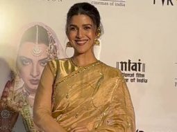 Nimrat Kaur in a beautiful golden saree
