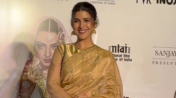 Nimrat Kaur in a beautiful golden saree