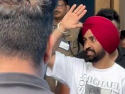 Diljit paji waves to the paps at the airport