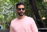 How cute! Angad Bedi in a pink gym fit