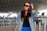 Neha Dhupia in a cool airport pajamas