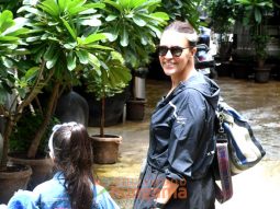 Photos: Neha Dhupia snapped with her daughter Mehr at a school in Bandra