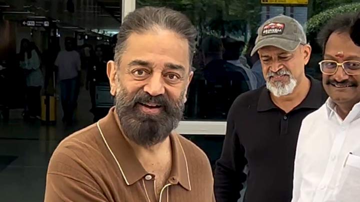 Kamal Hassan greeting fans at the airport