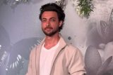 Ayush Sharma looks dashing while he pose for media