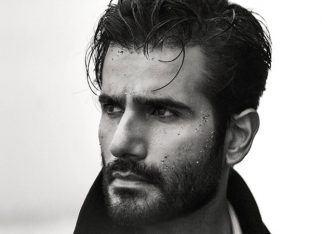 Karan Tacker sets the shore on fire in dreamy Trench Coat shoot; fans call him a ‘storm in stillness’