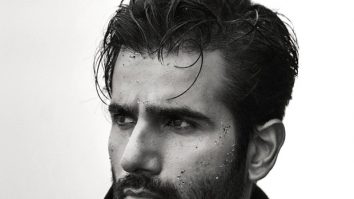 Karan Tacker sets the shore on fire in dreamy Trench Coat shoot; fans call him a ‘storm in stillness’