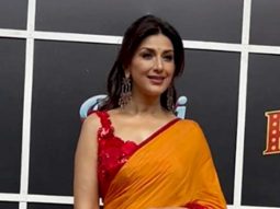 Sonali Bendre looks brightening beauty in an orangish red saree