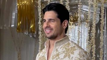 New dad Sidharth Malhotra pose for media in white & gold