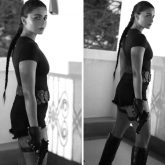 Alia Bhatt’s Lara Croft-inspired Halloween 2025 look features a braided ponytail, holster belt, and monochrome power dressing