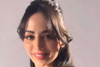 Zoya Afroz in a rosy red dress