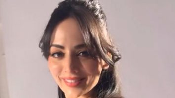 Zoya Afroz in a rosy red dress