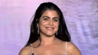 Shenaz Treasury in a silver shimmer gown