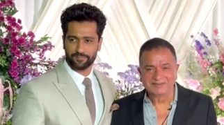 Vicky Kaushal with papa Shyam Kaushal pose for media