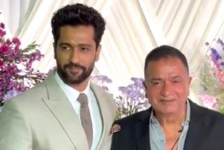 Vicky Kaushal with papa Shyam Kaushal pose for media