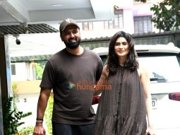 Photos: Karishma Tanna snapped with her husband and her newborn child as she returns to her home in Bandra