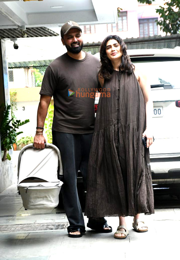 photos karishma tanna snapped with her husband and her newborn child as she returns to her home in bandra 2