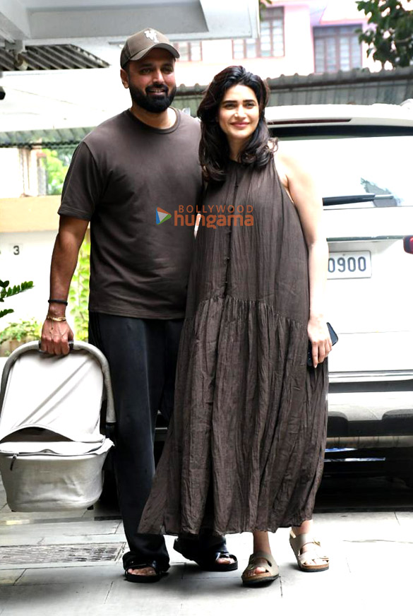 photos karishma tanna snapped with her husband and her newborn child as she returns to her home in bandra 4