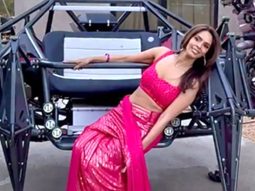Mallika Sherawat showing her playful side in a striking pink saree